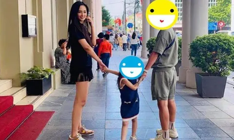 Xôn xao bức ảnh Mai Phương Thúy dắt tay bé gái cùng người đàn ông lạ